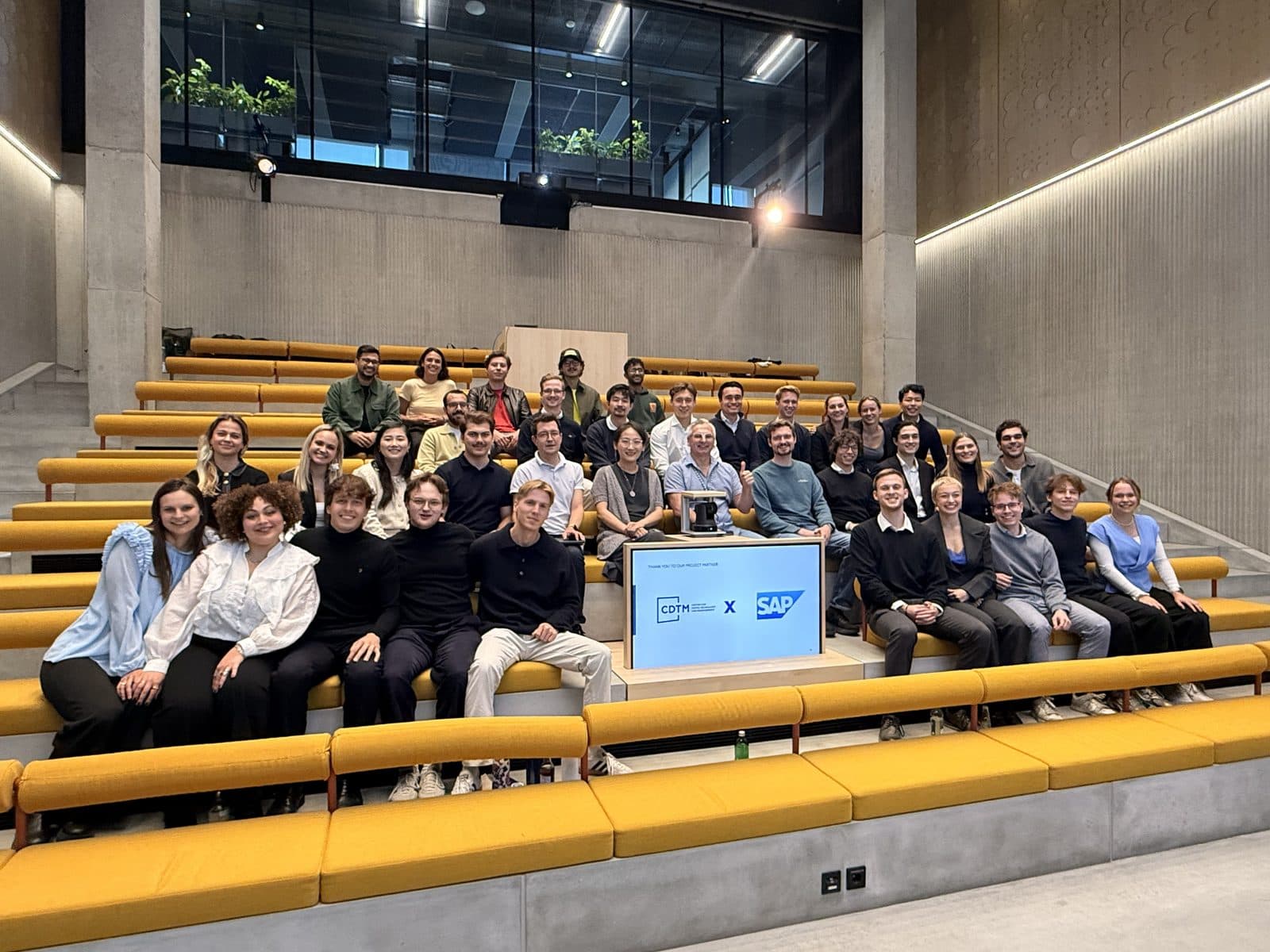 A CDTM class with their project partner SAP after the final presentation