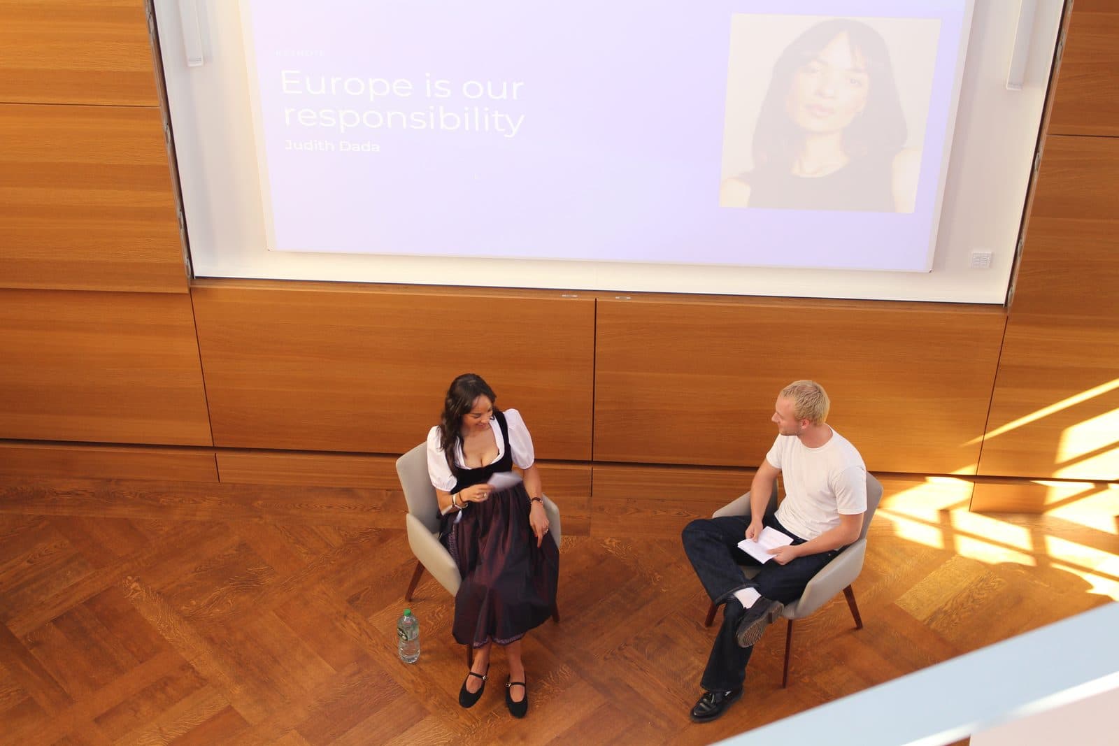 Judith Dada in conversation on stage after her keynote at CDTM