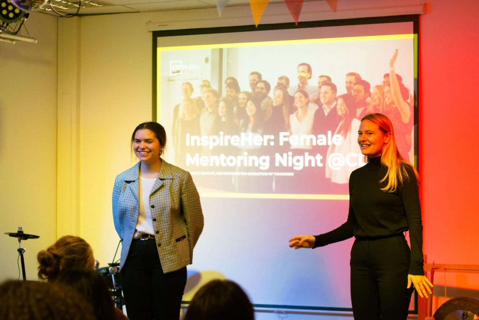 Two speakers opening the InspireHer female mentoring night at CDTM